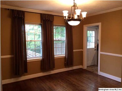 Bedroom 3, currently used as a formal dining room.