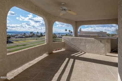 Balcony upper level & stairs to pool