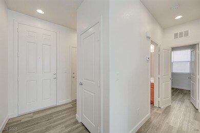 Front door,  door to garage, hall closet, hall to bed/bath