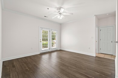 Unfurnished room with hardwood / wood-style floori