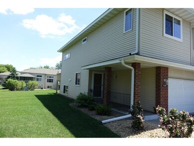 Private entry and green space adjacent to unit