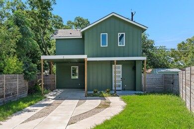 Back of property featuring board and batten sidin