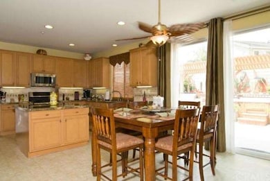 Open concept flow from Kitchen to Breakfast Nook t