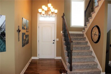 Enter into the 2 story high well lighted entryway.