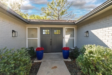Property entrance with brick siding