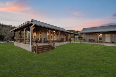 Back of house at dusk with board and batten sidin