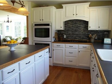 Bright kitchen w/large windows