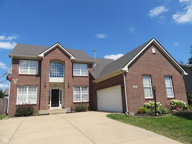 Maintenance free home with a 2 car garage that will accommodate a third auto.  Two-story entry and an extensive window package.