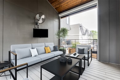 Wooden terrace with outdoor lounge area