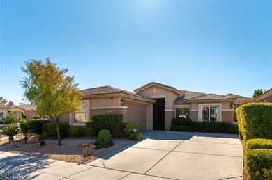 View of front facade featuring an attached garage,