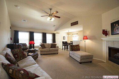 Generous vaulted Family Room is bathed in natural