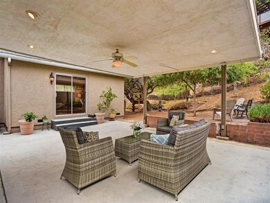 Covered Patio has recessed lighting, ceiling fan a