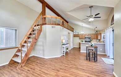 View of steps to the loft area & your open floor p