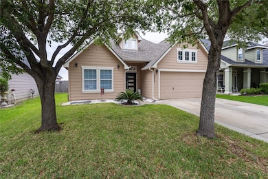 Charming and inviting landscaping enhances this ho