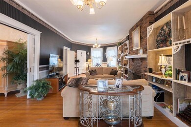 Enter the living room through the pocket doors.