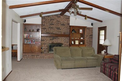 Check out this living room! Beams across the ceili
