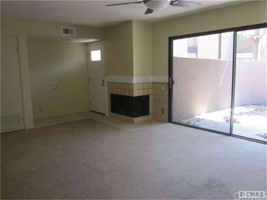 Living room with Fireplace & sliding door to enclo