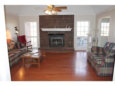 Inviting living room with hardwood flooring and br