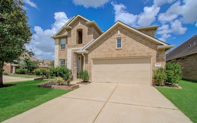 This charming two-story brick home features a well