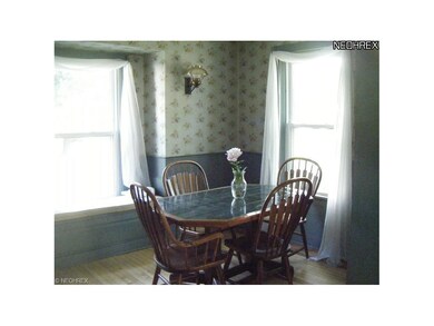 Formal Dining Room is nice and bright.