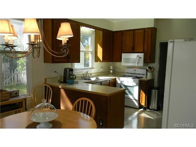 Large, eat-in kitchen with 7 windows! Updated appl