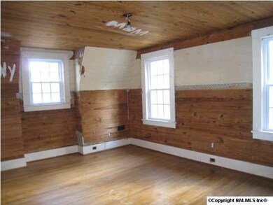 bedroom 3 upstairs note the nice wood construction