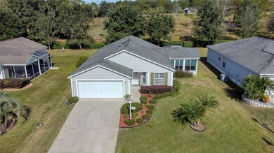 Aerial view showing open space behind home.