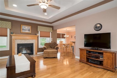View into great room from foyer, gas fireplace, cu