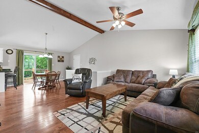 Open Floor Plan Living with gleaming hardwood floo