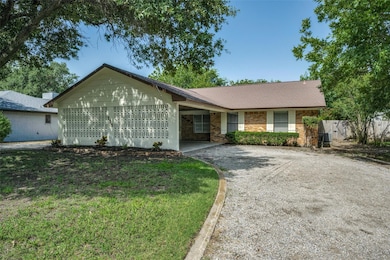 Ranch-style house featuring a front yard