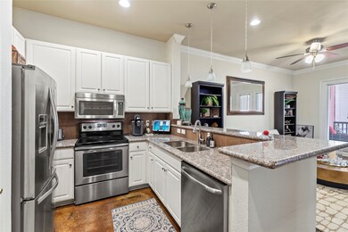 This galley kitchen offers plenty of room and Feat