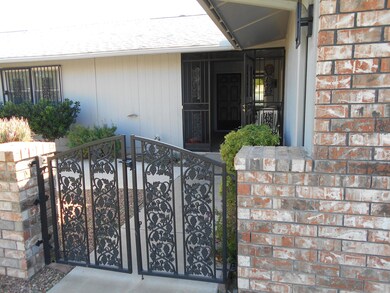 9867 W Spanish Moss Ct, Sun City, AZ 85373 - photo 2