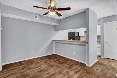 Dining area with ceiling fan