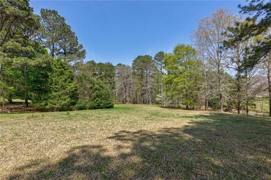 View of yard featuring a forest view