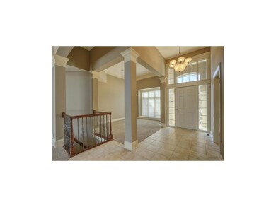 Tiled entry and wrought iron spindles. Fresh paint