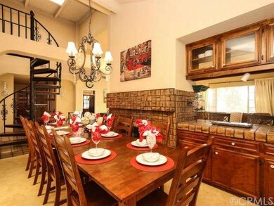 Formal Dining with see-through fireplace to living