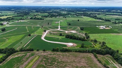 Aerial view of property and surrounding area with rural landscape