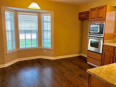 Kitchen has bay window