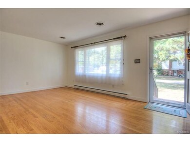 Living Room.  New glass door to exterior