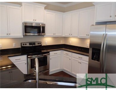 Kitchen. Beautiful white maple cabinets with black