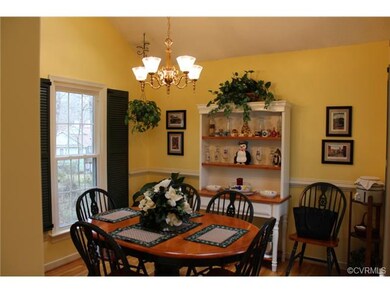 Dining Area with Vaulted Ceiling, Hardwood Floors,