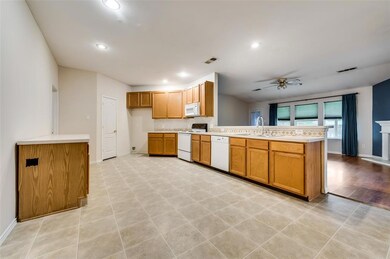 Open kitchen with canned lighting