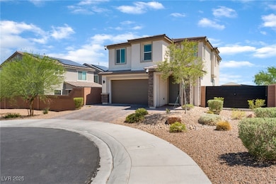 View of front of house featuring stucco siding, an