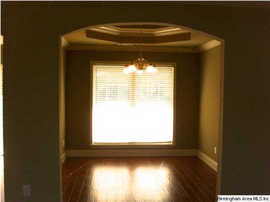 Double tray in dining room with crown molding.