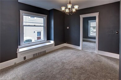 Another view of the dining room unfurnished