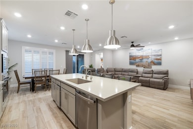 Kitchen featuring light countertops, visible vents