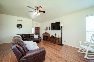 Wood flooring and neutral paint colors throughout