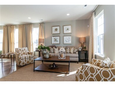 Family Room: Home is not built  this photo is from