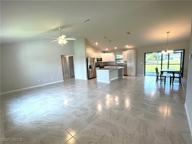 Unfurnished living room with ceiling fan with nota