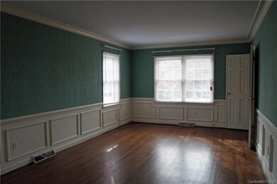 Living Room is spacious with hardwood floors throu